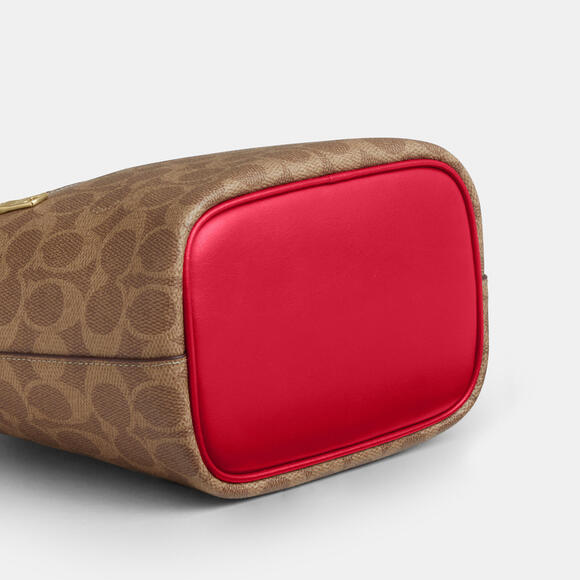 🤎 Coach NWT Tan Logan Duffle Bag In Signature Canvas With Carnation Strap - Picture 2 of 8